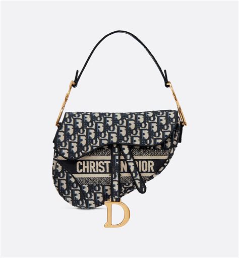 dior saddle pochette price|pre owned Dior saddle bag.